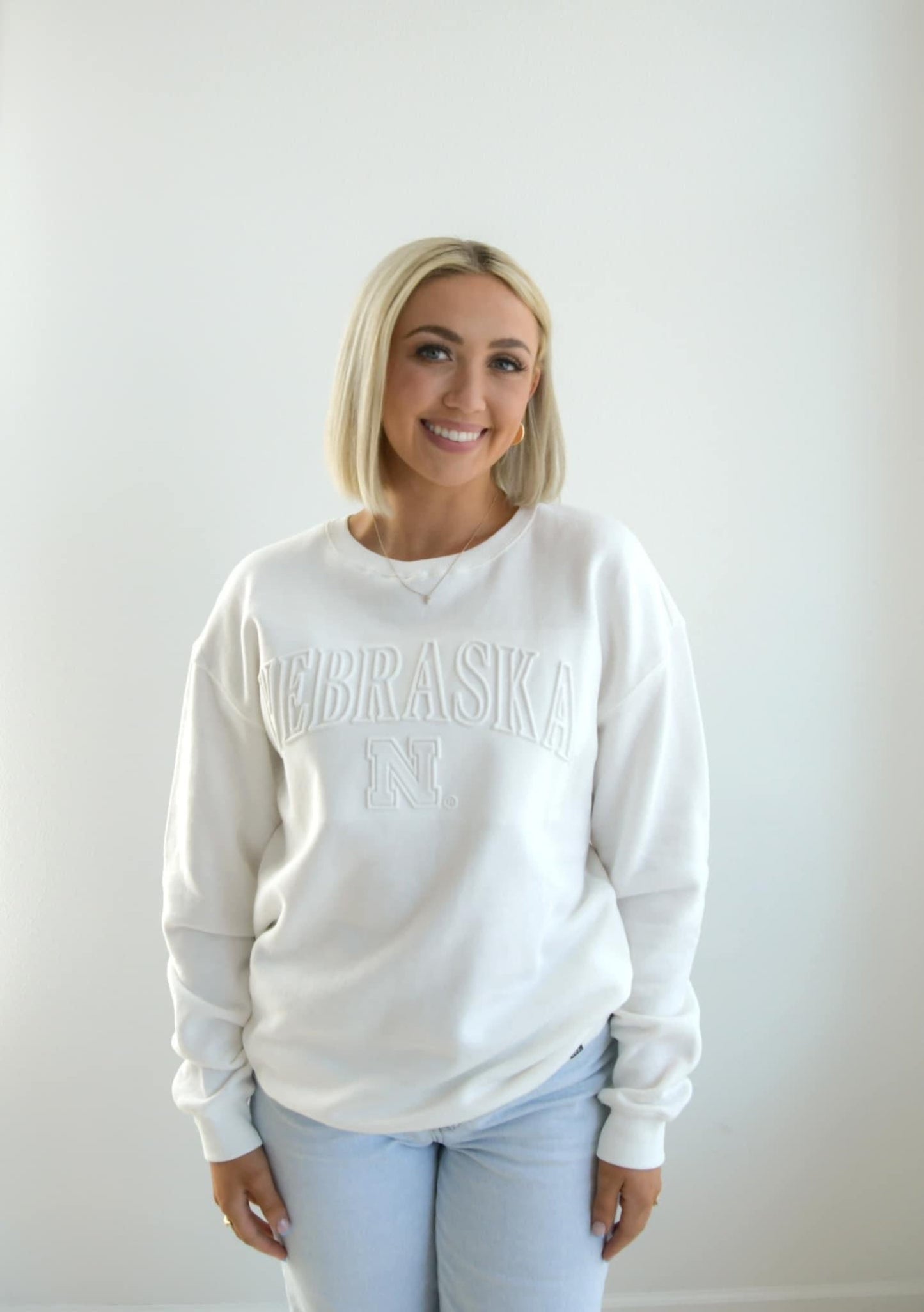 Nebraska Ivory Vintage Embossed Crewneck Sweatshirt